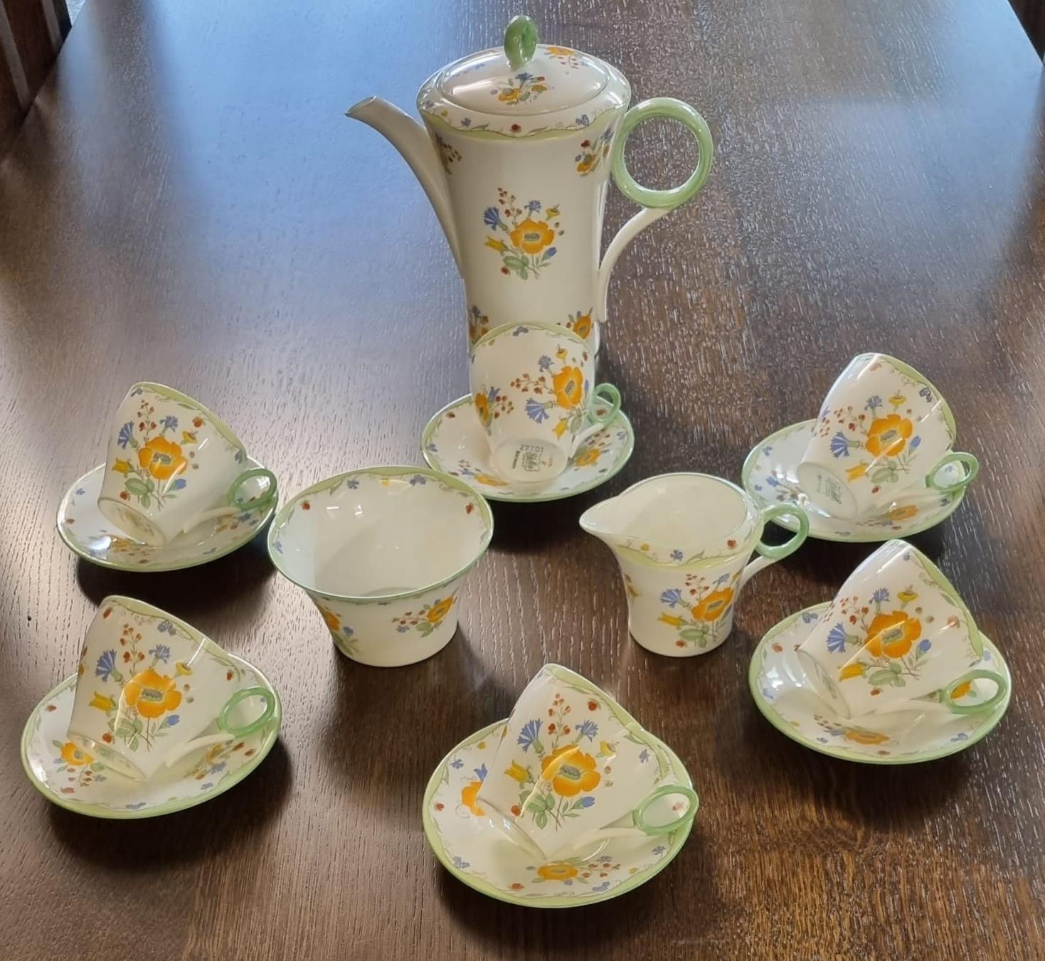 Shelley bone china floral decorated coffee set to include; coffee pot, sucrier, cream jug and six