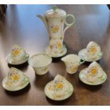 Shelley bone china floral decorated coffee set to include; coffee pot, sucrier, cream jug and six