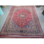 Middle Eastern design Mashad carpet of large proportions on a multi-coloured ground decorated with