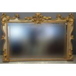 19th Century carved gilt wood rectangular over mantel mirror with foliate C scroll mouldings