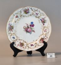 19th Century porcelain Nantgarw plate on a white ground with hand painted tumbling baskets and