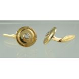 A pair of 18ct gold diamond set cufflinks. Approx weight in total 7 grams. (B.P. 21% + VAT)