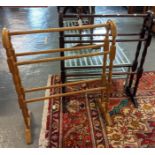 Two similar stained and natural beech towel horses with arched ends. 61cm across approx. (2) (B.P.