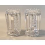 Pair of cut lead crystal vase shaped flared vase lustres with prismatic droppers, on circular
