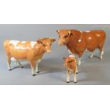 Two Beswick cows, one marked 'Sabrinas' Sir Richmond and a calf. (3) (B.P. 21% + VAT)