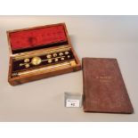 A Sikes Hydrometer in original mahogany box appearing complete, together with a book of Sikes
