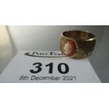 9ct gold wide engraved shell cameo ring. Ring size L. Approx weight 6.9 grams. (B.P. 21% + VAT)