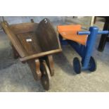 Small child's wooden and painted ride on toy, together with a wooden wheelbarrow. (2) (B.P. 21% +