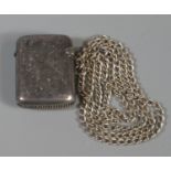 Small silver chased and engraved vesta case with plated chain. (B.P. 21% + VAT)