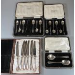 Collection of cased cutlery to include; pair of christening spoons, a set of six teaspoons with