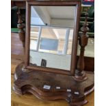 Victorian mahogany toilet mirror with square pellet plate on baluster turned horns with a shaped