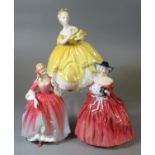 Three Royal Doulton bone china figurines to include The Last Walts HN2315, Genevieve HN1962, and