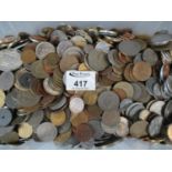 Plastic box of British and World coins and tokens. (B.P. 21% + VAT)