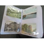 Postcards collection in maroon album; topographical, humorous etc. 200 cards with Welsh interest. (
