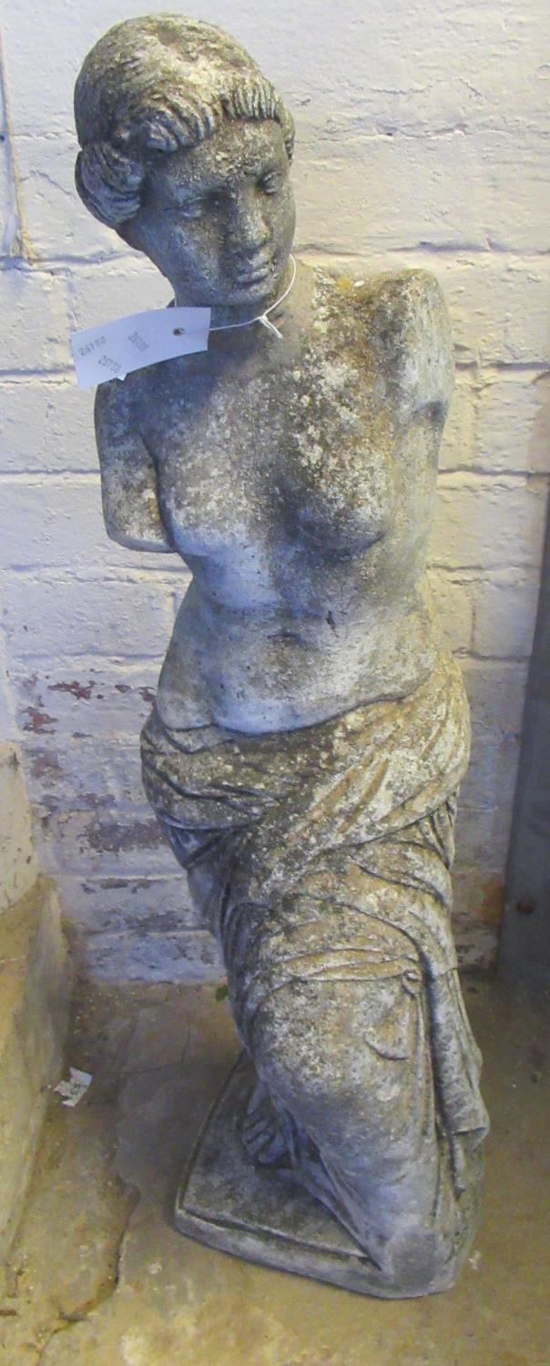 Modern composition garden ornament of a semi-nude Grecian lady in robes. (B.P. 21% + VAT)