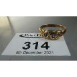 18ct gold sapphire and diamond ring. Ring size U. Approx weight 3.3 grams. (B.P. 21% + VAT)