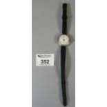 Early 20th Century silver cased fancy wristwatch with leather strap. (B.P. 21% + VAT)