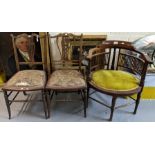 Edwardian mahogany smokers bow type stick backed elbow chair with oval padded seat on turned legs,
