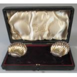 A cased pair of shell shaped silver salts, Birmingham 1898. (B.P. 21% + VAT)