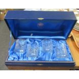 Cased set of four Thomas Webb crystal British made whisky tumblers with star cut bases. (B.P.