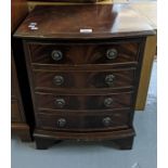 Reproduction mahogany bow fronted lamp table of four cock beaded drawers. 46cm wide approx. (B.P.