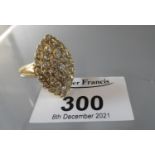18ct gold navette shape diamond cluster ring. Ring size P. Approx weight 12.8 grams. (B.P. 21% +