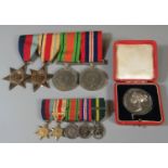 A Second World War unnamed medal group to include; 39-45 Star, Africa Star, Defence medal and 39-