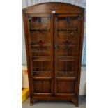 Early 20th Century oak two door stained glass leaded bookcase with adjustable shelves. (B.P. 21% +