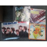 Box containing various vinyl LP records to include; three from The Beatles; Rock & Roll Music Volume