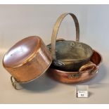 19th century brass preserving pan with fixed iron handle with a more modern two handled copper