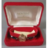 9ct gold lady's Omega wristwatch with leather strap, the box marked Montine of Switzerland. (B.P.