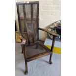 Mid Century stained beech caned high backed elbow chair. (B.P. 21% + VAT)