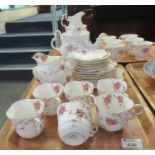 An Aynsley 1930's 21 piece bone china rose design part teaset to include; teacups, milk jug,