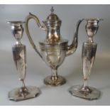 Pair of silver plated classical design candlesticks decorated with swags and foliage, together