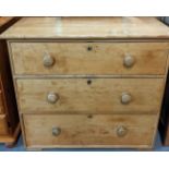 19th Century stripped pine straight fronted chest of three drawers with turned knobs. 91cm wide