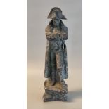 Hollow ceramic figure of Napoleon Bonaparte in pensive pose on rock. 35cm high approx. (B.P. 21% +