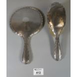 Silver two piece vanity set comprising hand mirror and brush, Birmingham hallmarks. (B.P. 21% + VAT)
