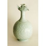 Chinese porcelain globular vase with incised, carved and relief decoration