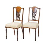 A pair of Sheraton revival mahogany carved and inlaid salon chairs