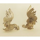 Silver plated fighting cocks / roosters.