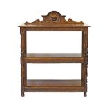 A Flemish / Dutch Renaissance style carved oak three tier console / étagère / dumb waiter