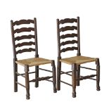 A pair of French antique provincial oak ladder chairs