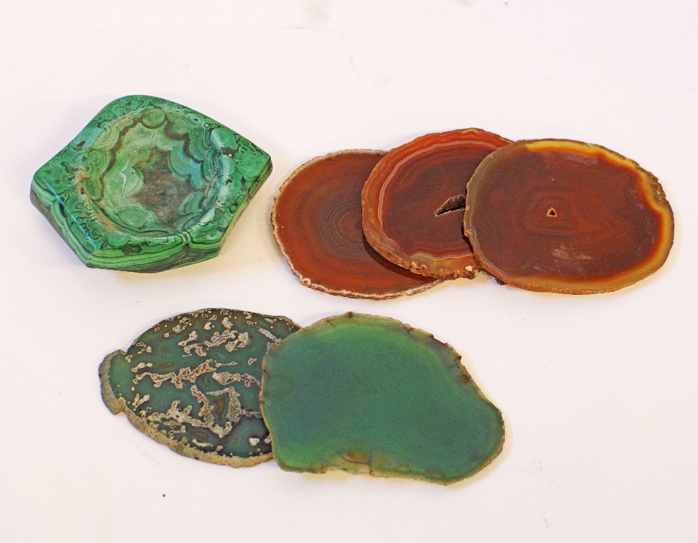 Mineral coasters and a malachite ashtray.