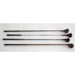 Hickory and steel shafted wood golf clubs.