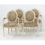 A set of four carved Louis XVI style fauteuils