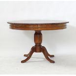 A round pedestal breakfast table