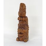 Carved head of a green man