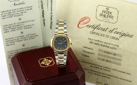 Patek Philippe Automatik Nautilus 750/- GG Edelstahl .mit box und Papieren