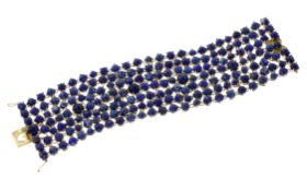 Armband 128.82 g 750/- Gelbgold mit 191 x  Lapislazuli zus. ca. 161.39 ct. Laenge 19.00 cm