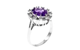 Ring  3.68 g 585/- Weissgold mit 10 Diamanten zus. ca.0.30 ct. F/vs und 1 Amethyst ca. 3.00 ct. Ring